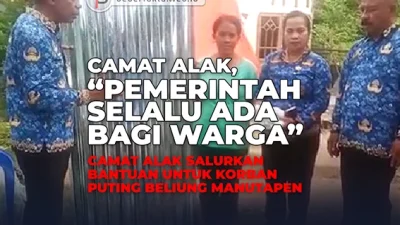 PEMERINTAH HADIR - Bantuan Camat Alak, Yulianus Willem Pally kepada warga terdampak bencana di Kelurahan Manutapen, bukti pemerintah selalu hadir untuk warganya. (Foto: Istimewa)